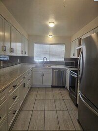 Building Photo - Completely Remodeled Condo; Very Private & Quiet