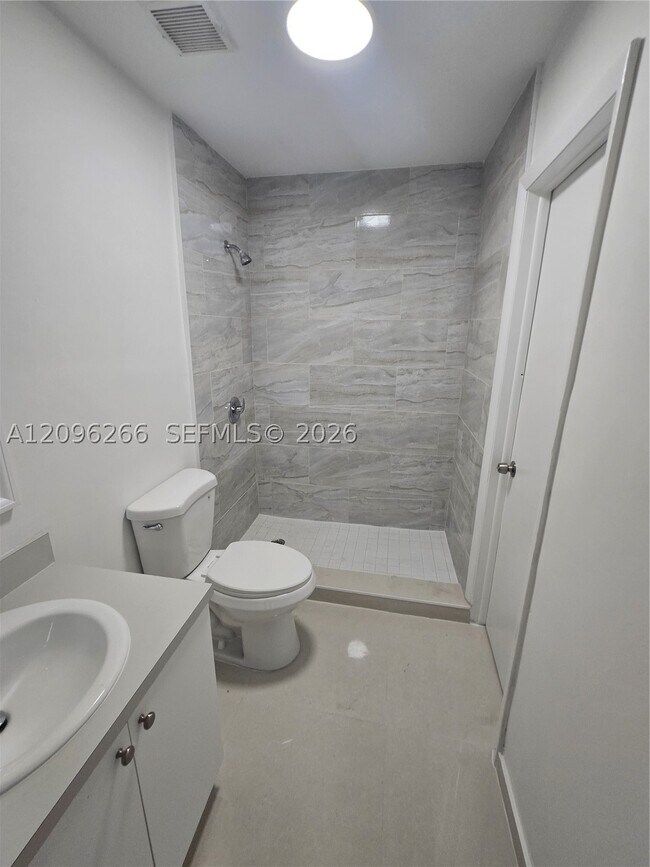Building Photo - 6151 W 24th Ct