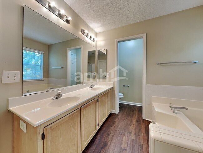 Building Photo - 8703 Coach Wood Ct