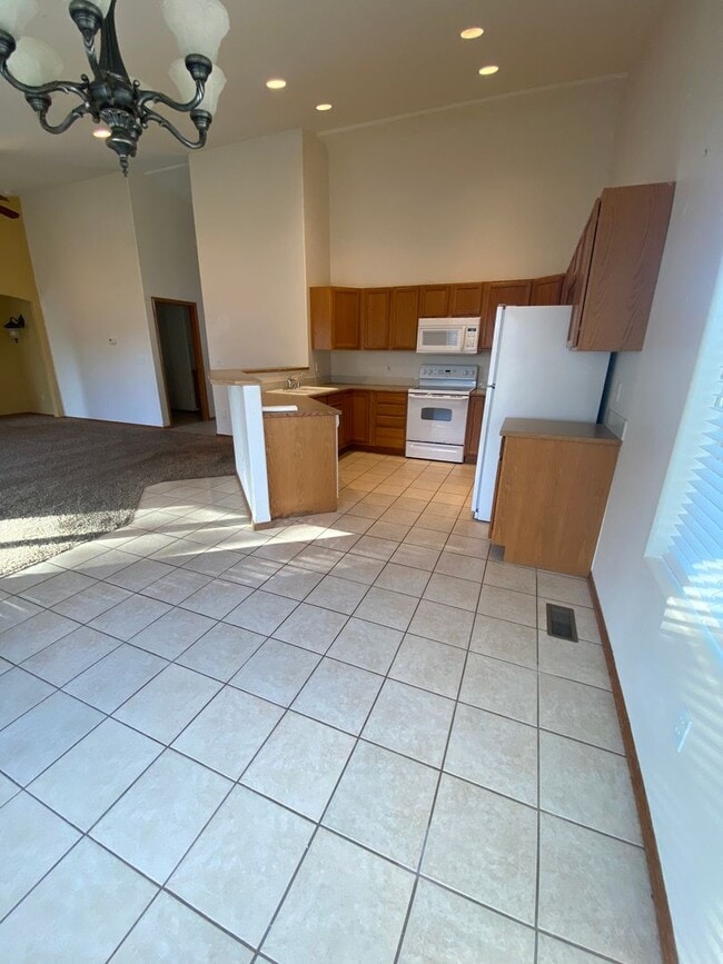 Building Photo - April Rent Free - House with Triple Car Garage