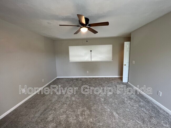 Building Photo - 8745 Whispering Pines Dr