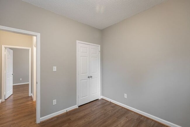 Building Photo - Like New Home off Freeman Mill. Just Painted, New Wood/Vinyl Flooring, Vaulted Ceilings, Front Po...