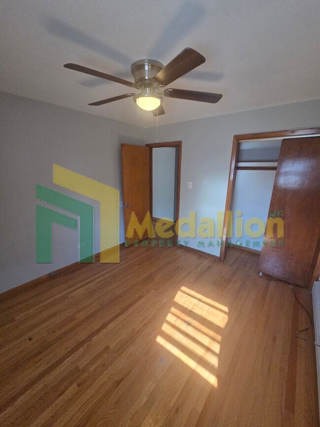 Building Photo - Spacious 6-Bedroom Home with Finished Basement and Backyard