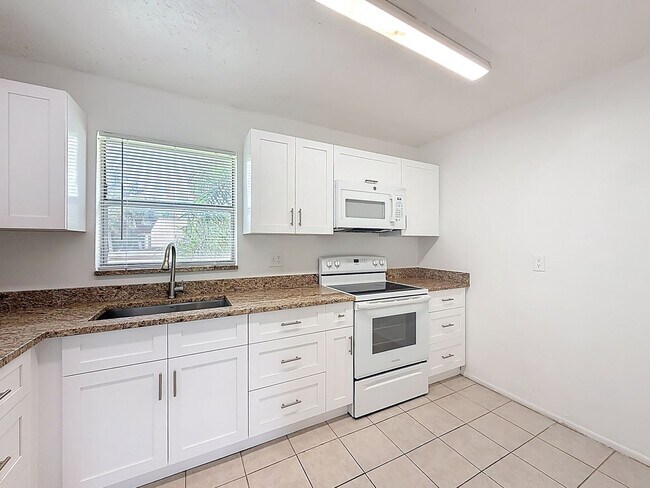 Building Photo - Desirable 55 plus community condo unit with a view of the lake on the 2nd Floor.