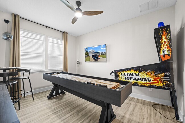 Building Photo - "Luxurious Furnished Home with 4-Bed, 3-Bath, Swim Spa Fenced Yard Golf Cart steps to the beach!"