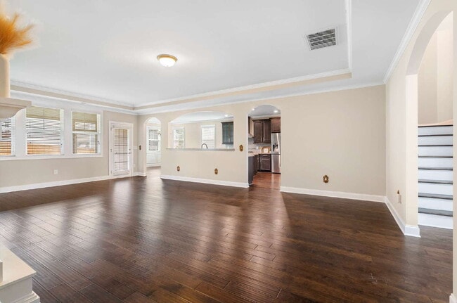 Building Photo - Luxurious 4-Bedroom Retreat with Third Floor Bonus Room & Fenced-in Backyard
