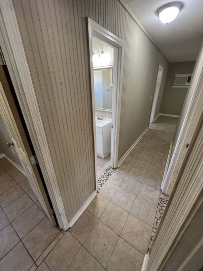 Building Photo - Cozy Brick Home with Covered Parking – Denova St.