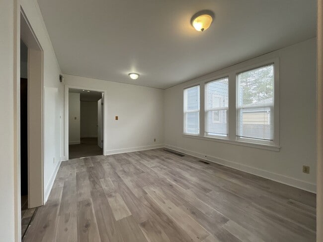Building Photo - Expansive 4BR 2,900+ Sq Ft Home with Theater-Style Living Room & Bonus Hobby Workshop