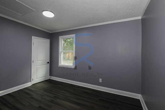 Building Photo - LIMITED-TIME OFFER! Apply today with NO APPLICATION FEE! Terms apply. Call (678) 487-7896, Option...