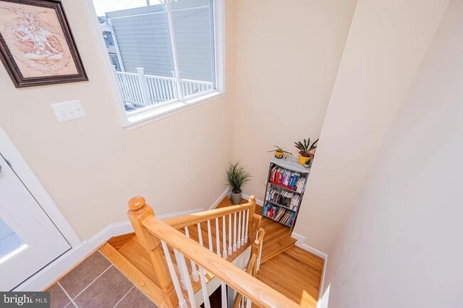Stairs flooded with natural light - 217 S Regester St