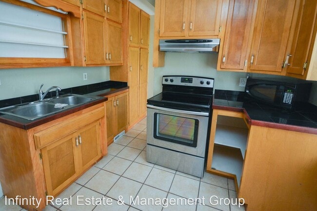 Building Photo - 2 br, 1 bath House - 907 4th Ave NW
