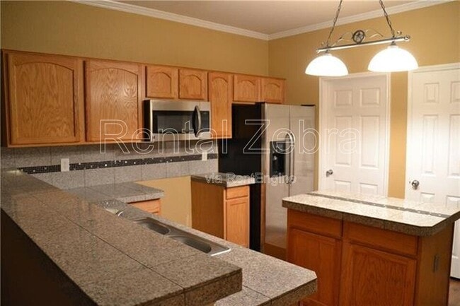 Building Photo - 1121 McKavett Dr