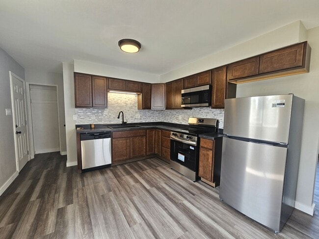Primary Photo - NE 3 bedroom 1 bath with garage near shopp...