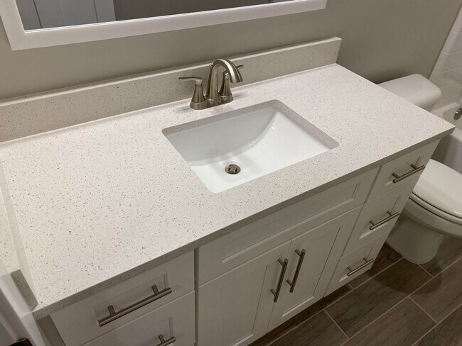 Building Photo - 3 Bedroom Townhome. Water, Sewer, and Garbage Included!