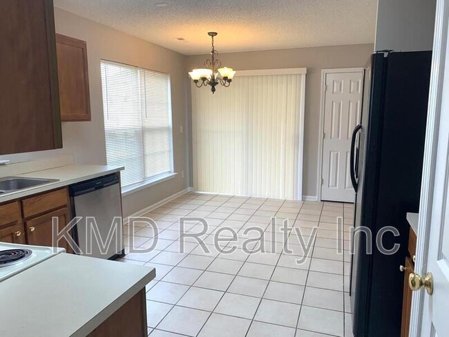 Building Photo - 4010 Woolcott Ave