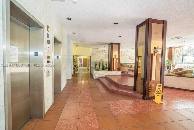 Building Photo - 4675 W 18th Ct