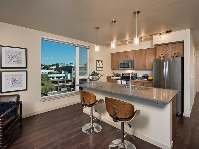 Kitchen island in select homes - Infinity Capitol Hill Apartments