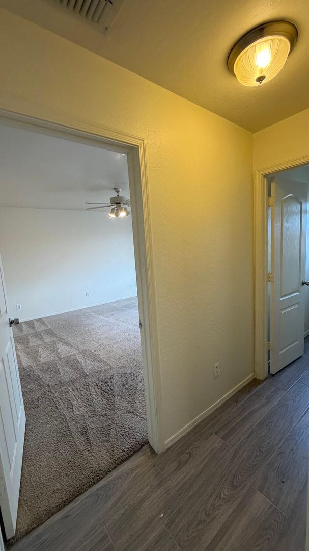 Building Photo - Two Story Home with NEW tile and a large backyard!