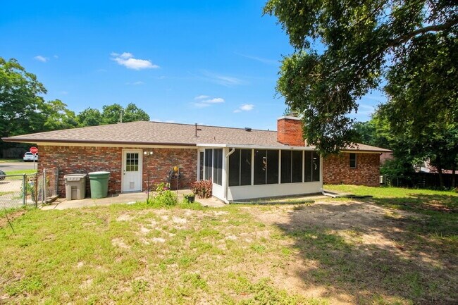 Building Photo - Spacious 4BR, 2BA Central Pensacola Home on a Large Corner Lot with Sunroom & 2-Car Garage