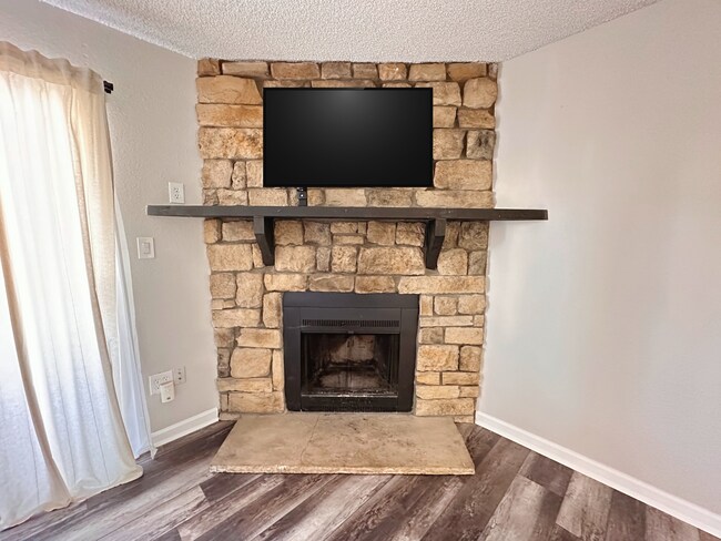 Living Room Fireplace - 4400 S Quebec St
