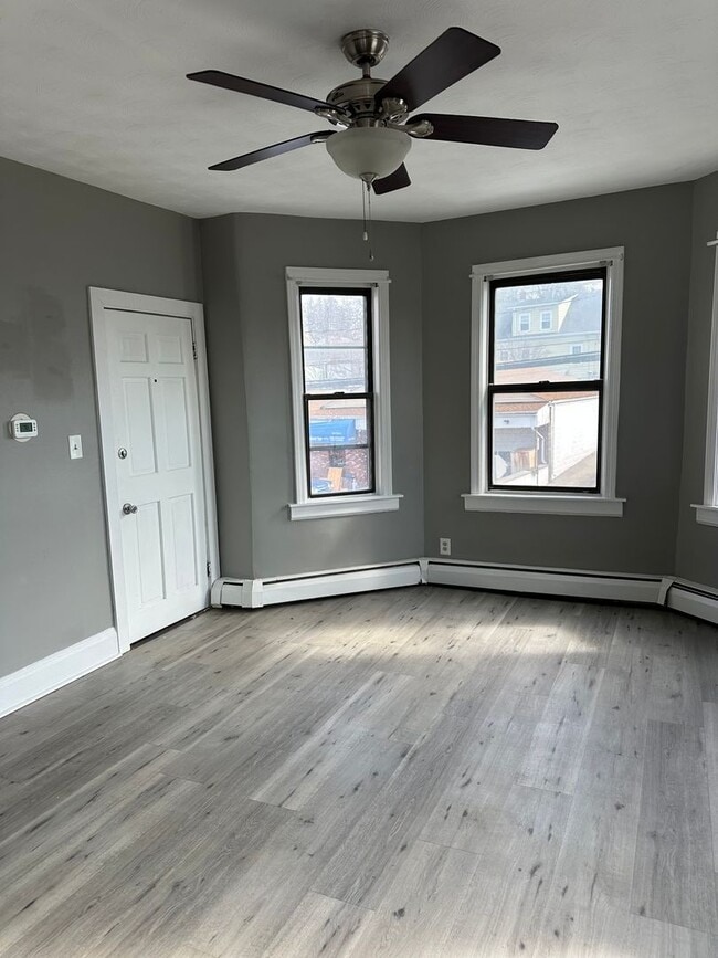 Building Photo - Spacious three-family property on Charles Street in North Providence