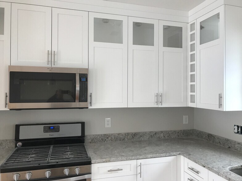 Tall cabinets-lots of storage - 134 Parsons St