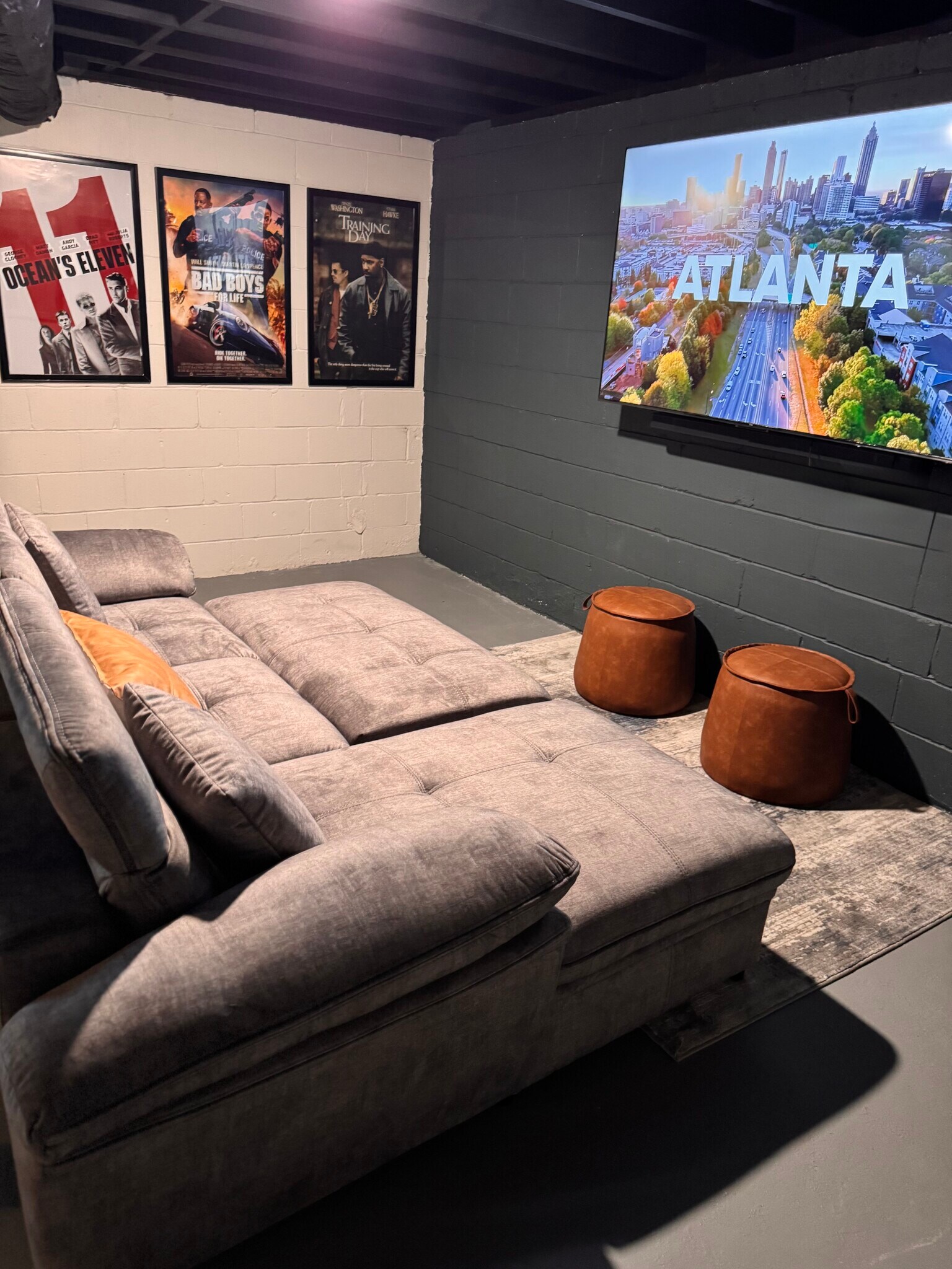 A comfortable media room designed for movie nights, gaming, or relaxing with the family. - 2394 Bouldercliff Way SE