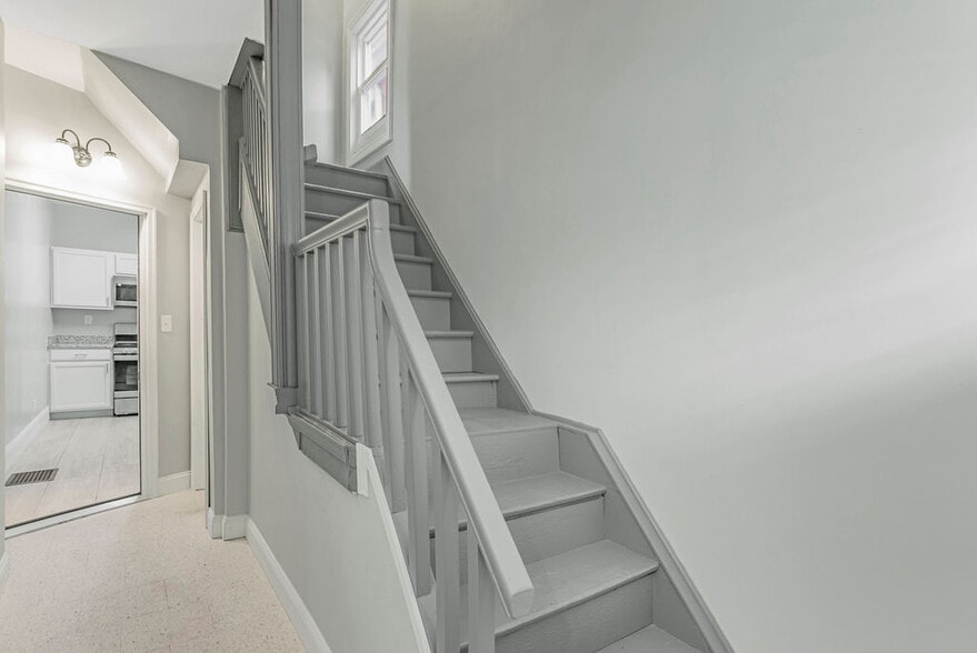 Stairs to the second floor unit - 5125 Carthage Ave