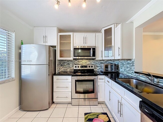 Building Photo - 8740 N Sherman Cir