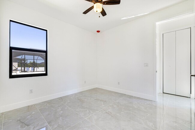 Building Photo - Brand-New Coastal Retreat | 4BR Home in NW Cape Coral