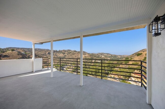 Building Photo - Modern Elegance Meets Scenic Privacy in Be...