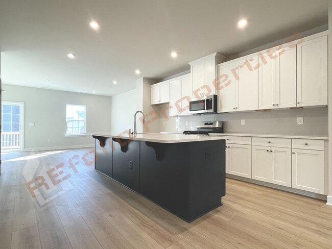 Building Photo - Beautiful brand new 3-Story Townhome | 4 B...