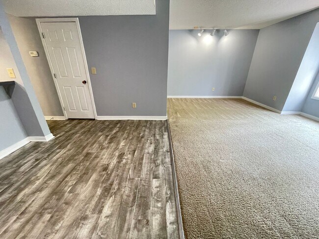 Building Photo - Updated, spacious 4br 2ba condo within wal...