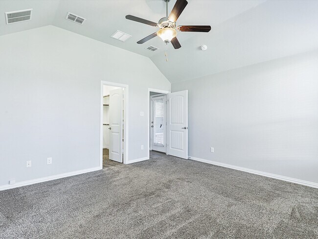 Primary bedroom, walk in close on the left, livng room and back door on the right. - 836 Caliente Pass