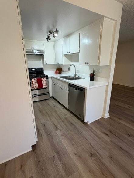 Floor plan D kitchen - Sun Harbour Apartments
