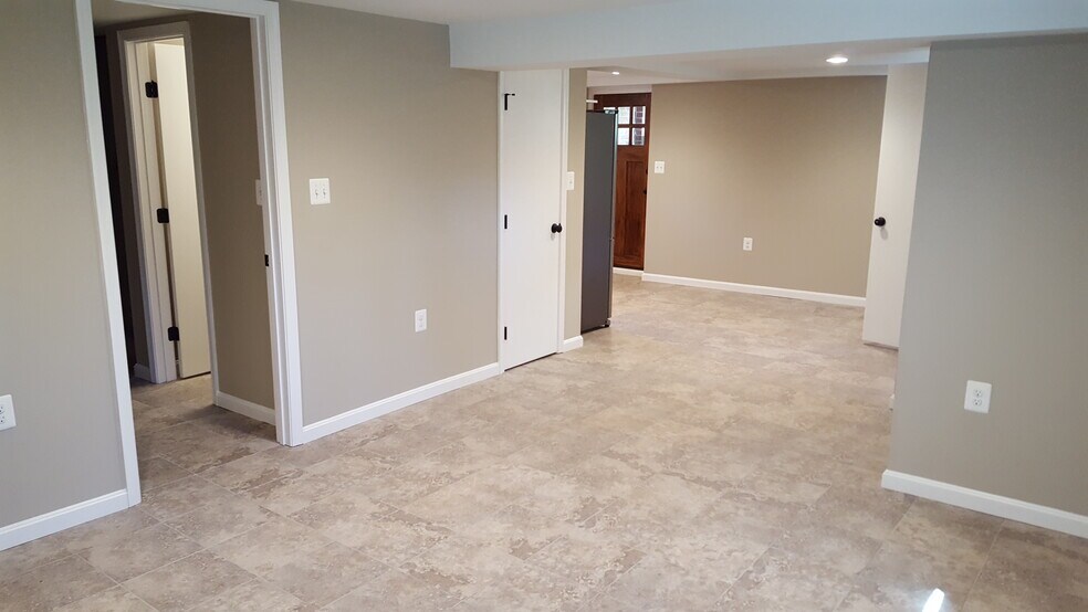 living room into dining/kitchenette - 6905 Rhode Island Ave