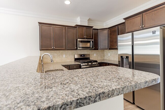 Building Photo - Brand new Luxurious 3 bedroom 3 bath + LOFT townhouse in Stone Gate community High Point. Master ...