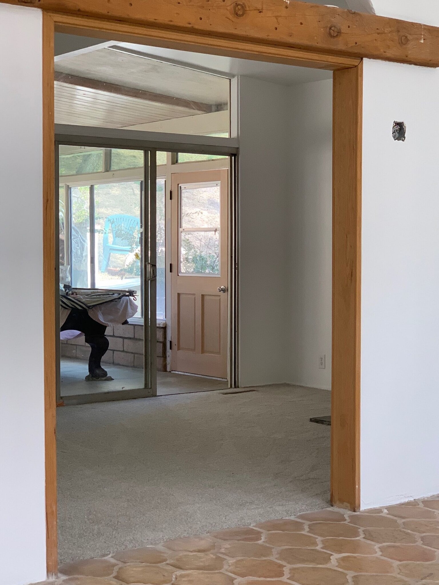 View from entertaining room into living room and sun room - 10458 Pearson Pl