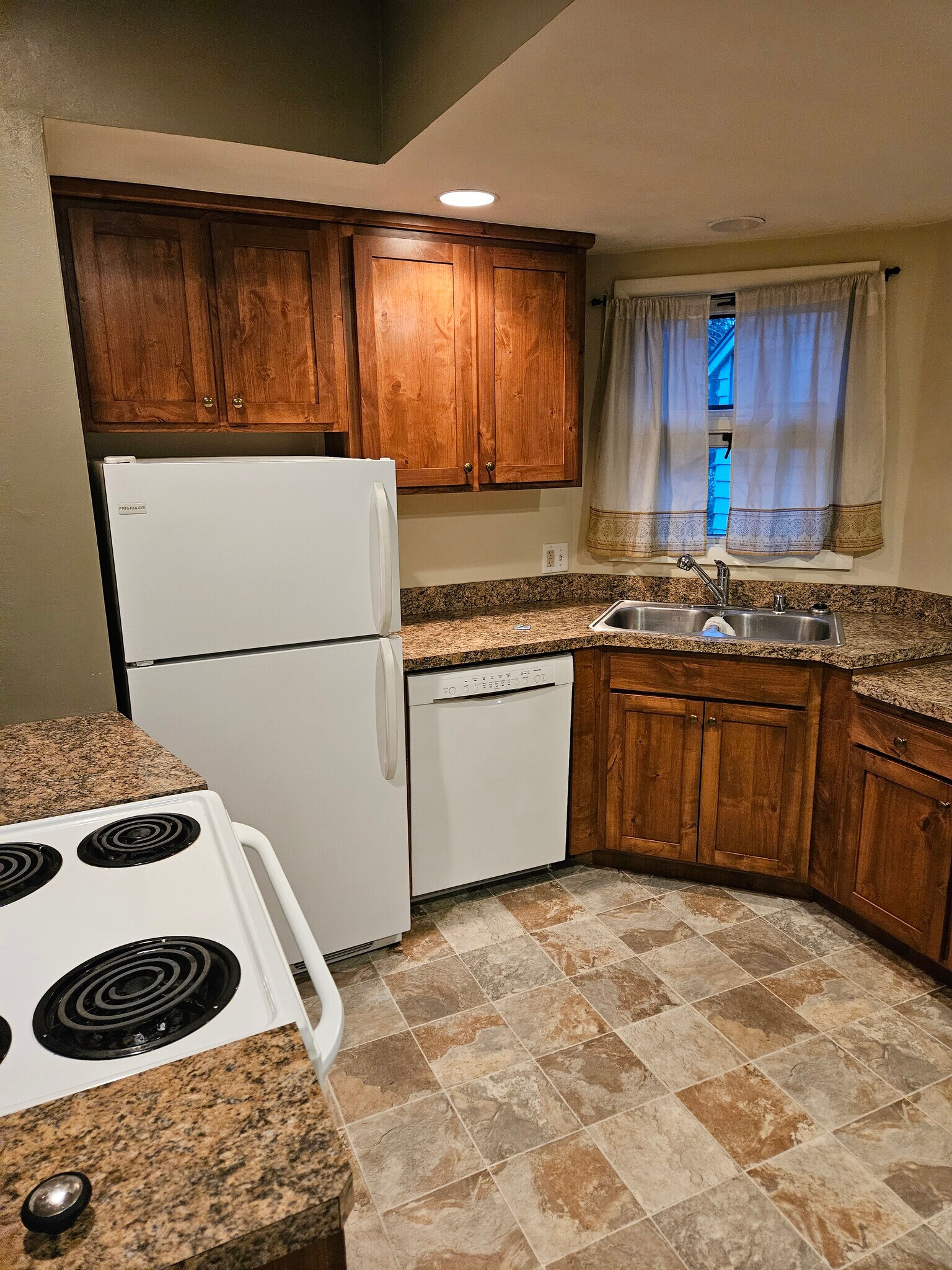 Kitchen with updated appliances - 1207 W 7th Ave