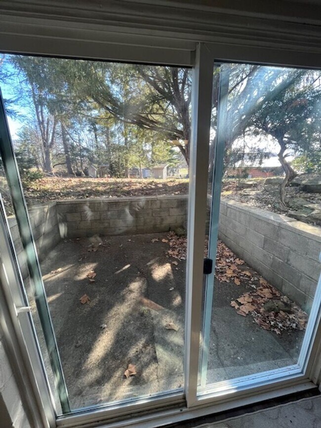 Building Photo - Spacious, Fully Updated Home with Walkout Basement on a Mature Lot