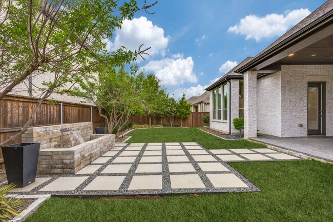 Building Photo - "Luxurious 4-Bed Retreat with Movie Room & Marble Elegance in Celina, TX!"