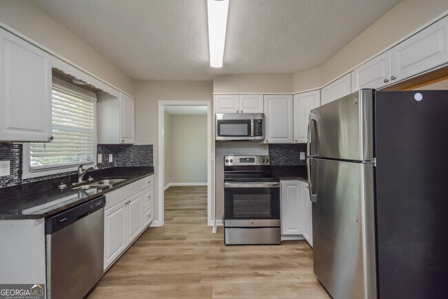 Building Photo - 6950 Carleen Ct