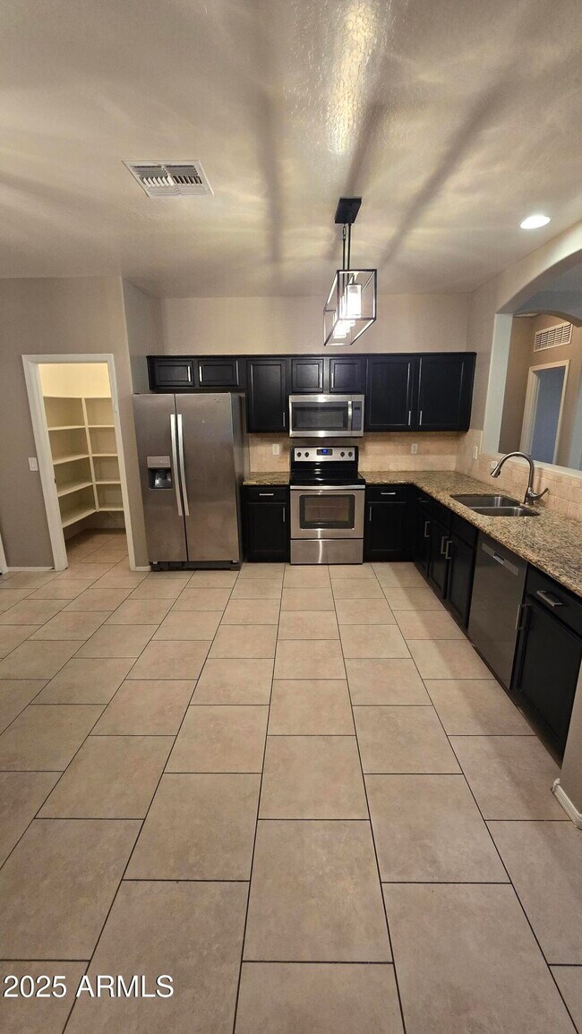 Building Photo - 17848 W Acapulco Ln