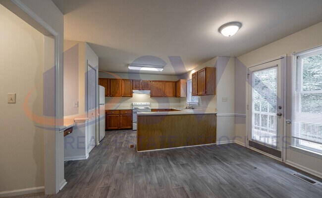 Building Photo - Cottage living in this 3-Bedroom, 3-Bath House with First Floor Master Bedroom!