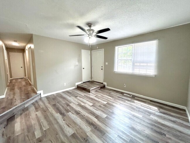 Building Photo - Spacious 4-Bedroom, 2-Bath Home Located in...