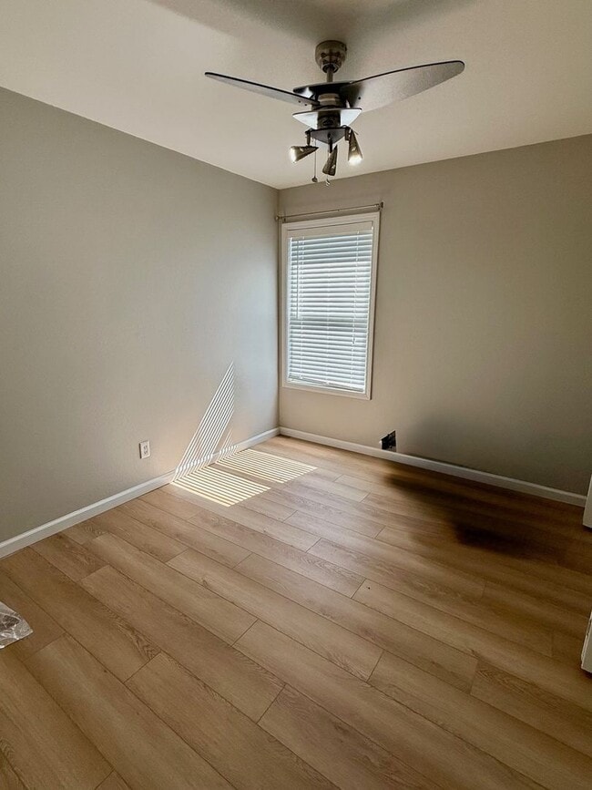 Building Photo - Updated 3BR Home with Luxury Vinyl Plank Flooring Throughout & Spacious Yard