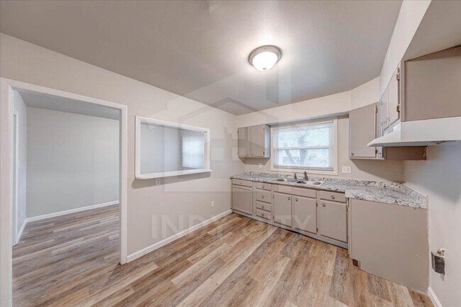 Building Photo - 3451 N Hartman Dr