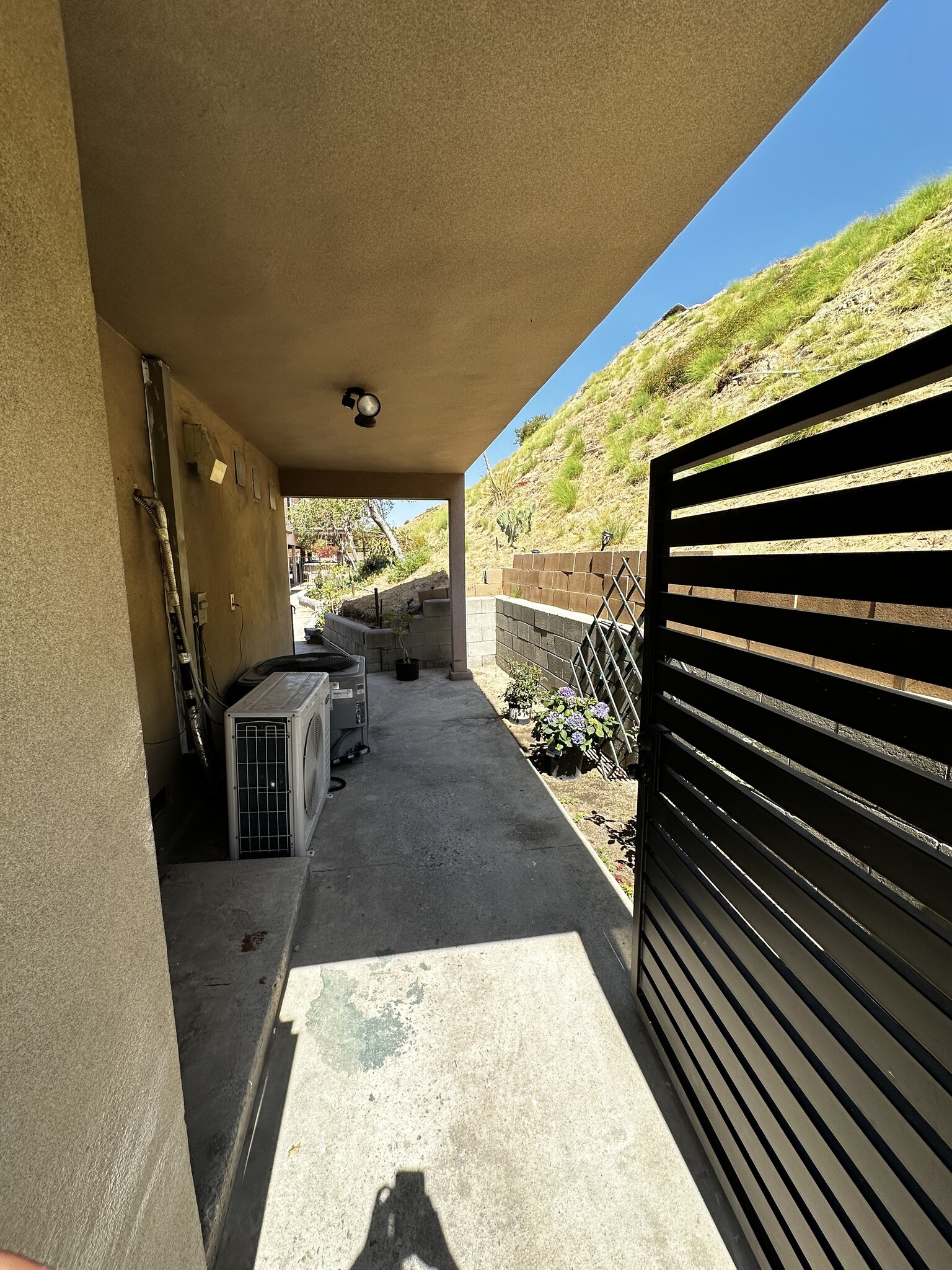 Covered area for water and dryer hook up - 8532 Vine Valley Dr