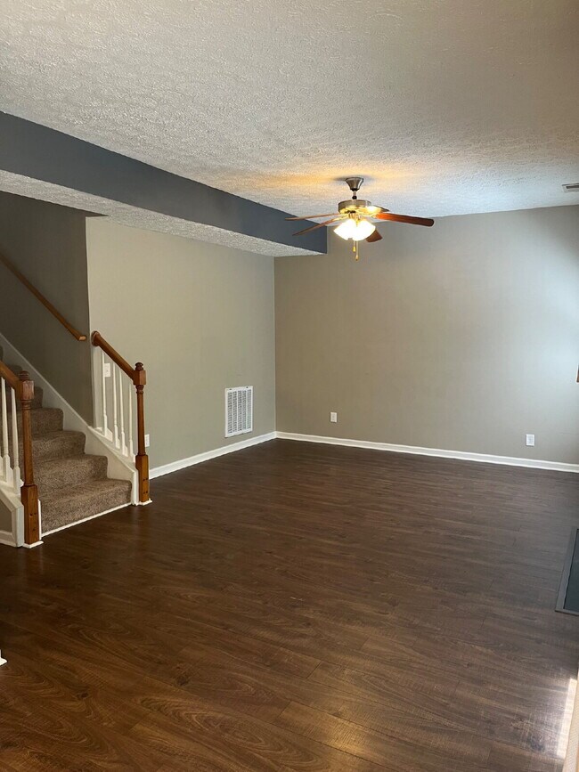 Building Photo - "Spacious 3-Bedroom Townhouse Retreat with Fireplace & Hardwood Floors in Antioch!"