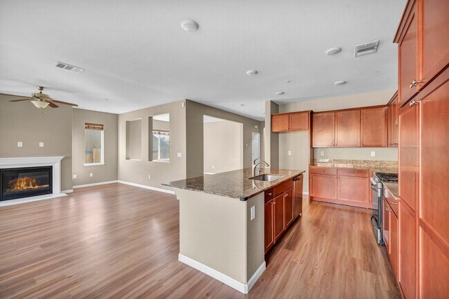 Building Photo - Sun-Filled, Spacious Living with a Three-Car Garage